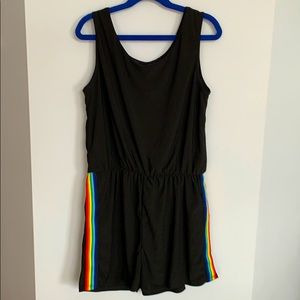 Adorable black jumpsuit with rainbow stripes